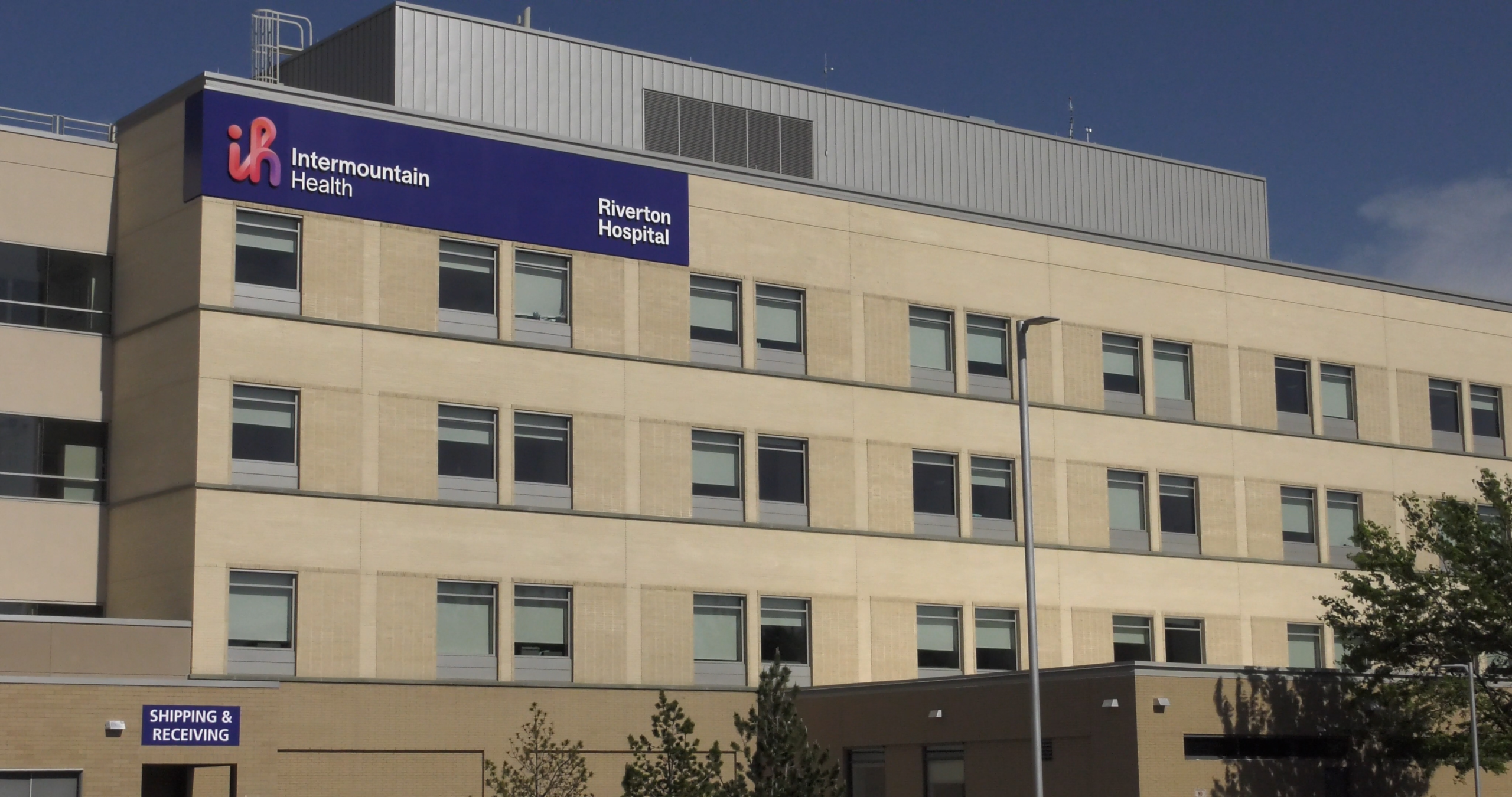 Intermountain Health Riverton Hospital Exterior. Brown building with hospital sign